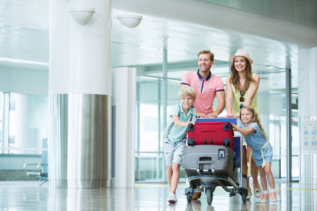 family with children at the airport